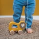 Деревянная игрушка-каталка на веревочке Лев Trixie Baby (5400858361776) - изображение 3