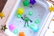 Набір для ванни Glo Pals святковий персонаж + 2 світячі кубики Зелений (0850016823168) - зображення 3