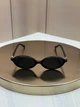 Солнцезащитные очки Miu Miu SMU 04Z - F черные овальные узкие ацетатные, серая линза, женские, - изображение 2