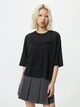 Футболка хлопковая оверсайз женская Uniqlo 20827268 XS Черная (1159874175) - изображение 1