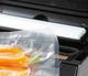 Вакуумный пакувальник 20 л/мин 0,9 бар для кухни 2 рулона и 10 пакетов Domo FK-1469 - изображение 9