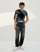 Джинси кльош BERSHKA Flared чорний 0851/180/800 32 - зображення 1