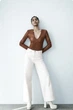 Боді з екошкіри з довгими рукавами та V-подібним вирізом коричневе Zara розмір XS - изображение 3