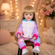 Реалістична лялька реборн Reborn Baby Doll Melody 55 см – вінілова дівчинка з довгим волоссям та аксесуарами, можна купати - изображение 5