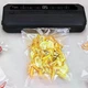 Вакуумный упаковщик Food Vacuum Sealer 65 кПа с резаком и пакетами, черный - изображение 2