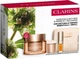 Набір для догляду за обличчям Clarins Extra-Firming Крем для обличчя 50 мл + Змінний блок крему для обличчя 50 мл + Олія для губ 1.4 мл + Косметичка (3666057413650) - зображення 2
