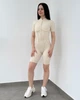 Спортивный женский комбинезон-шорты декоративными швами чашечками открытой спиной и молнией для фитнеса зала Молочный L (KSHK4L) - изображение 3