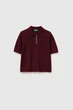 Однотонна футболка-поло Benetton 40(XS) Бордовий-299 (151424) - зображення 1