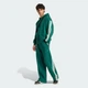 Мужские джоггеры ADIDAS KIT 3-STRIPES WIDE adidas KW2400 (L) зеленый (4069991426554) - изображение 3