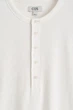 Лонгслів чоловічий COS slim ribbed cotton long-sleeved henley t-shirt 1333150001 S Молочний - изображение 6