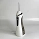 Ирригатор для полости рта 200 мл портативный аккумуляторный с 4 насадками Oral Irrigator, беспроводной с 3 режимами работы для ухода за зубами, деснами и брекетами Белый, AND-1-37-White - изображение 13