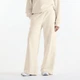 Женские бежевые спортивные брюки New Balance Trackside French Terry 38 (M) (WB62412FLIT) - изображение 1