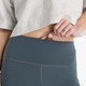 Жіночі сіре тайтси NB Sleek Pocket High Rise Legging 25" 38 (M) (WP51268GT) - зображення 4