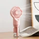 Ручний вентилятор - зволожувач повітря на акумуляторі Humidifying Fan тришвидкісний міні-вентилятор / міні-кондиціонер із розпиленням води, 15.7х6.8 см, рожевий (103945197) - зображення 4