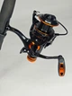 Катушка для спиннинговой рыбалки YUMOSHI 4000 14+1BB 300 г с байтранером, безынерционная, алюминиевая шпуля - изображение 1