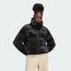 Женский пуховик WINTERIZED adidas KT4235 (XL) черный (4068817030357) - изображение 1