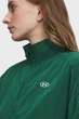 Жіноча зелена вітровка Rival Woven Top Under Armour M 6013565-312 - зображення 3