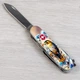 Нож Victorinox Huntsman Ukraine Mat Gloss Бежевый/бирюзовый (1049-Vx13713.7_T3260pw) - изображение 9