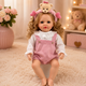 Реалістична лялька реборн Reborn Baby Doll Liana 55 см – дівчинка з кучерявим світлим волоссям та аксесуарами, можна купати (RB099) - зображення 6