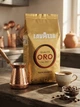 Зернова кава Lavazza Oro 1000 г кава в зернах арабіка 100% середньої обсмажки натуральна кава з насиченим смаком шоколадними нотками ароматна кава з легкою кислинкою солодкістю довгим післясмаком для еспресо автоматичної кавомашини - зображення 4