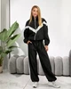 Жіночий костюм з контрастними вставками (кофта+штани) Uaclothes M-L Чорний (like39304-197411375) - зображення 1