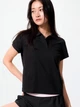 Поло женское Uniqlo 525125254 XL Черное (1161940153) - изображение 1