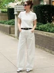 Поло женское Uniqlo 775035039 XL Молочное (1161939391) - изображение 2