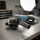 Болгарка Makita GA6020C 1100 Вт угловая шлифовальная машина 125 мм УШМ сетевая 220 В 3000 11000 об мин с регулировкой скорости шпинделем M14 муфтой SJS блокировкой защитой от повторного включения для резки зачистки шлифовки металла пластика камня - изображение 5