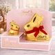 Шоколадні великодні кролики Golden Bunny Lindt з шоколадними яйцями 163 г - зображення 1