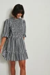 Міні-сукня NA-KD Check Smock Mini Dress чорно-біла в клітинку міні об'ємні рукави-буф з еластичними манжетами EU 36 - зображення 2