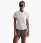 Футболка жіноча Nike Beige XS Бежевий HM9698-133 - зображення 1