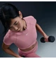 Спортивний топ жіночий Nike Dri-Fit Short-Sleeve Cropped Graphic Top Pink L Рожевий HM6369-699 - зображення 3