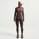 Спортивна кофта жіноча Nike W Nk Swift Df Uv Ls Crw M Фіолетова HQ0503-502 - зображення 1