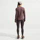 Спортивна кофта жіноча Nike W Nk Swift Df Uv Ls Crw M Фіолетова HQ0503-502 - зображення 2