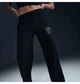 Спортивні штани жіночі Nike Sportswear Club Fleece Mid-Rise Wide-Leg Graphic Pants L Чорні HJ0869-010 - зображення 3