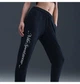 Спортивні штани жіночі Nike Sportswear Club Fleece Graphic Black S Чорні HV2346-010 - зображення 5