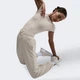 Спортивні штани жіночі Nike W Nk One Tf Pant Polar FB5578-104 M Бежеві - зображення 5