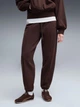Спортивні штани на флісі жіночі Puma HER Comfort Pants FL CL 69403233 XS Коричневі (4070033338643) - зображення 1