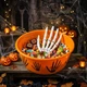 Оранжевая конфетница Halloween Candy Bowl с рукой скелета - изображение 2