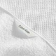 Комплект двусторонних вафельно-махровых полотенц Calvin Klein из плотного однотонного 100% хлопка (6 шт. – комплект для двоих) – белый - изображение 4