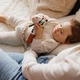 Игрушка для малышей мягкая с пищалкой и прорезывателем Коровка Бинго 25×7 см от 6 месяцев BabyOno 1688 разноцветный - изображение 5