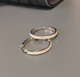Сережки кільця Circle Huggie з нержавіючої сталі - зображення 2