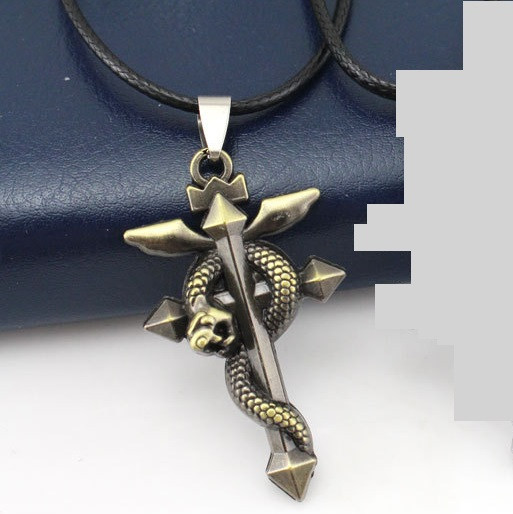 

Кулон КООRА крестик Cross Snake декорирован изображением крест и змея 00404