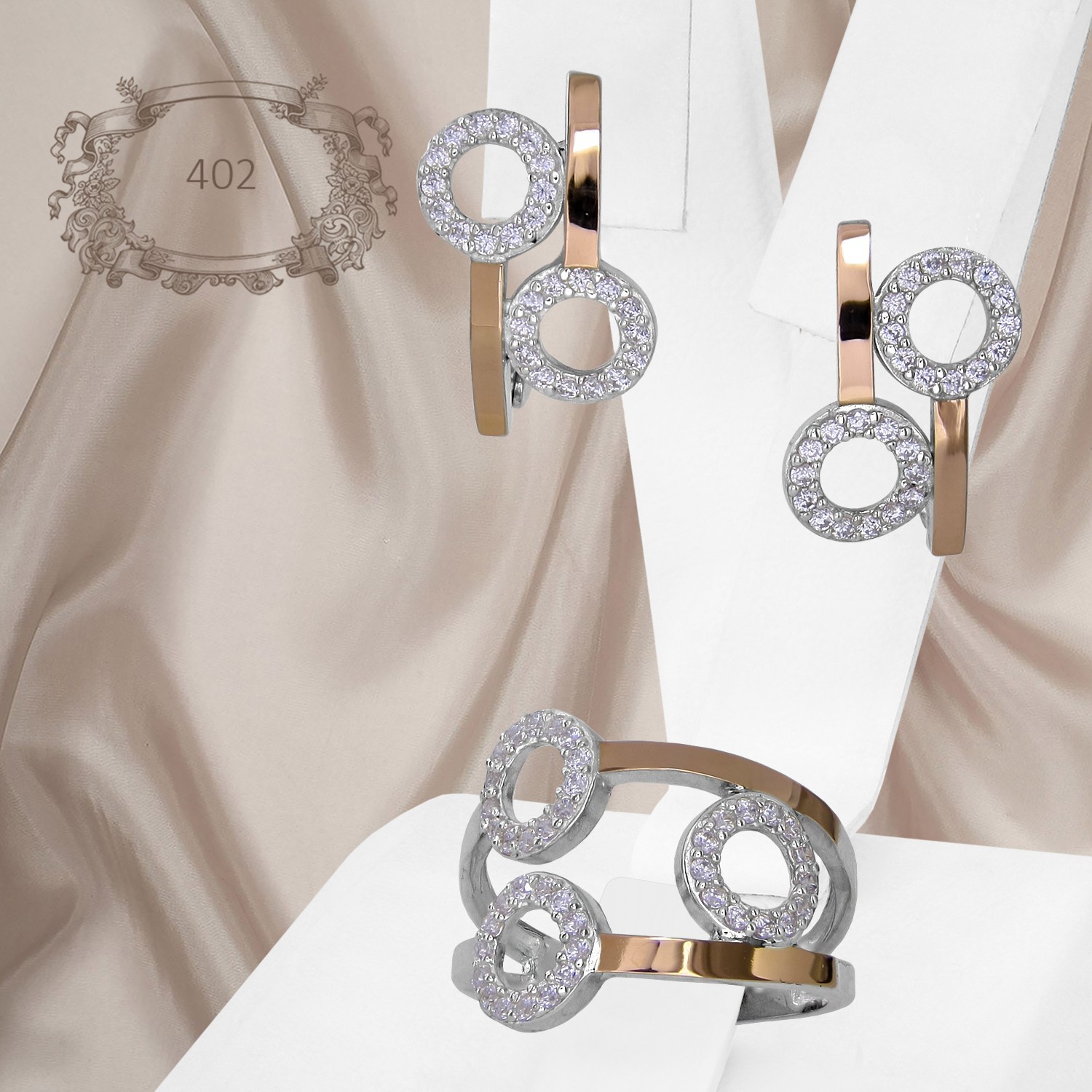 

Женский набор украшений из серебра 925 пробы с золотыми пластинами 375 пробы и белыми фианитами "402" 17 размер кольца