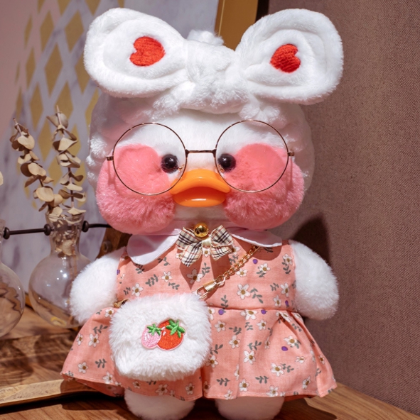 

Мягкая игрушка уточка Сafe-mimi duck с белой меховой повязкой на голове, 30 см