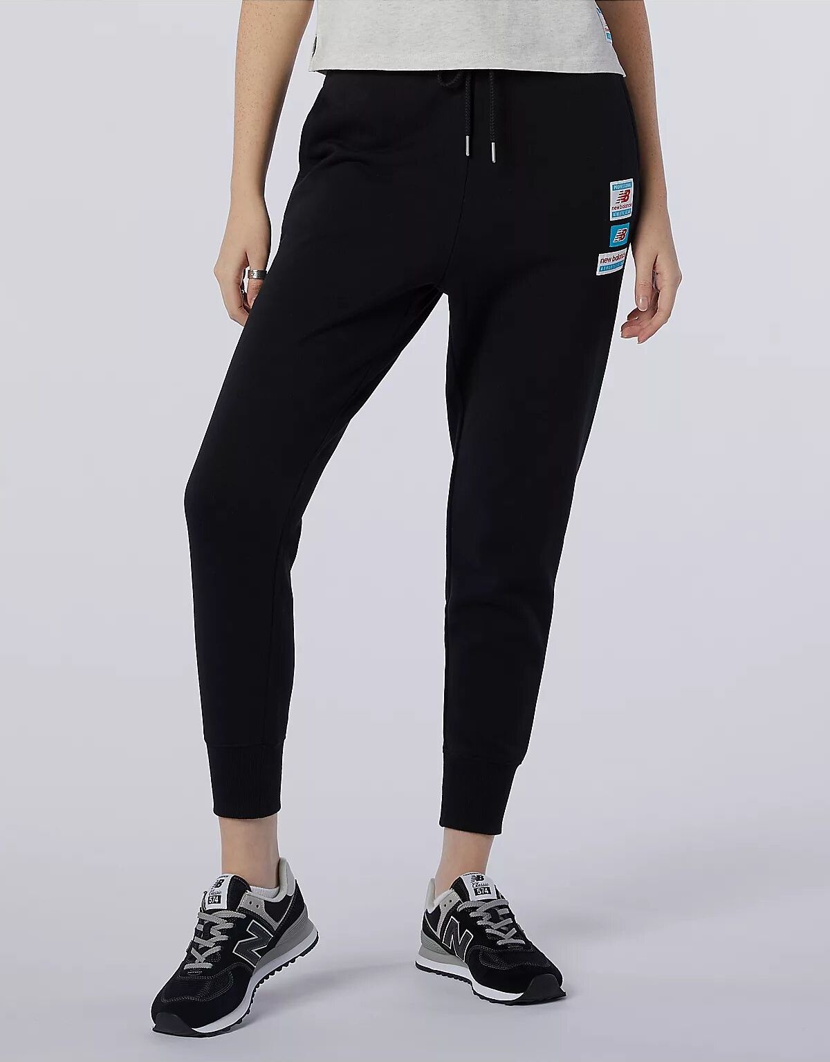 

Спортивные штаны New Balance Ess Field Day WP11507BK L Черные