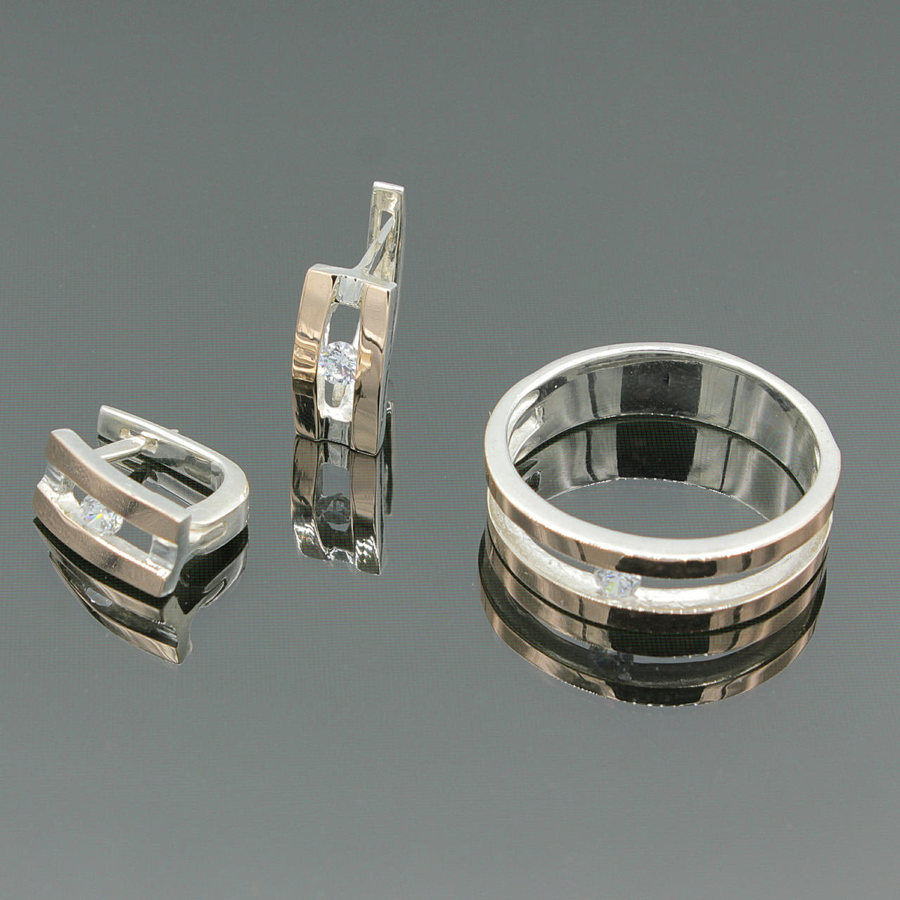 

Серебряное кольцо и серьги с золотыми вставками Дуэт 19