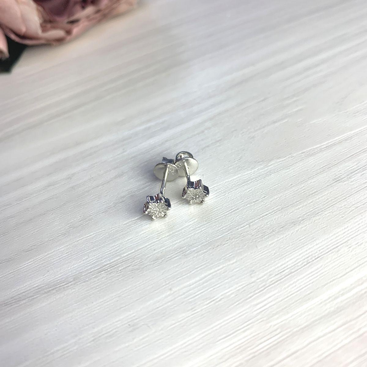 

Серебряные серьги SilverAlex с натуральными бриллиантом 0.02ct