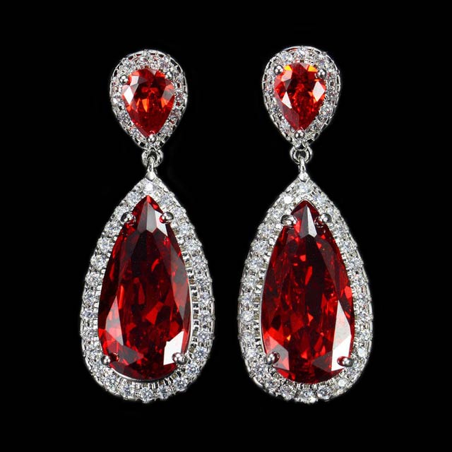 

Серьги Вечерние DiaDemaGrand Серебряный с красным камнем (srkt1210602-15-10)