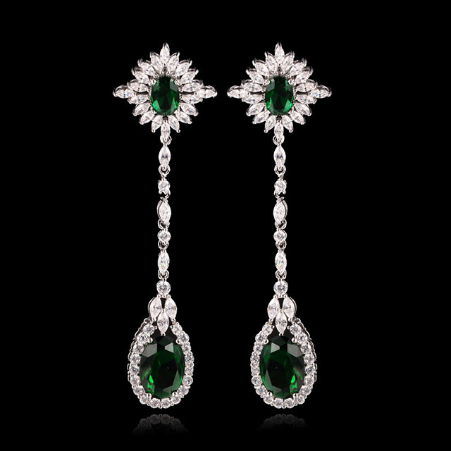 

Длинные серьги Острый камень DiaDemaGrand Серебряный с зеленым камнем (051518653-15-7)